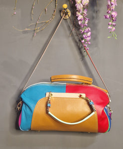 Oska Johansson, Leather Rainbow Bag. Brown and Blue Facing panels.